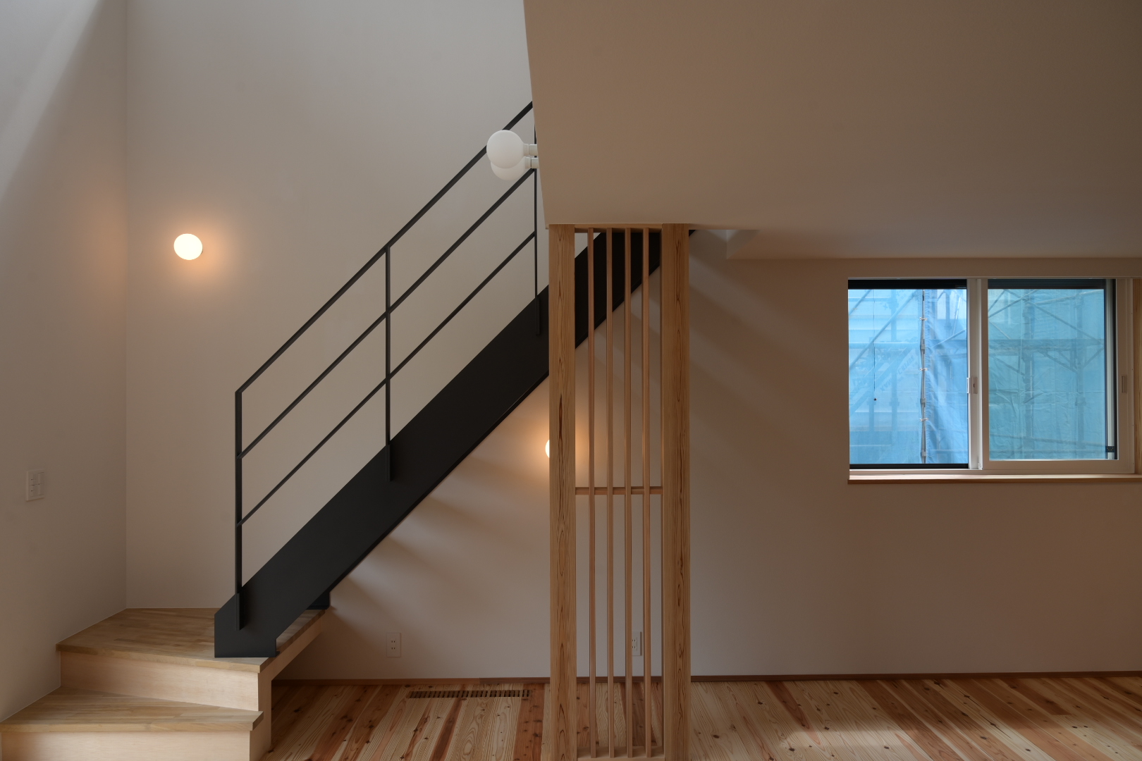 2023 Q1住宅in八幡の家　リビング階段の写真